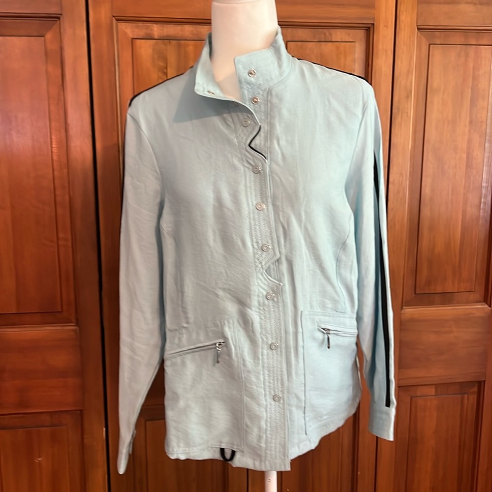 Jamie Sadock, blue and black golf jacket